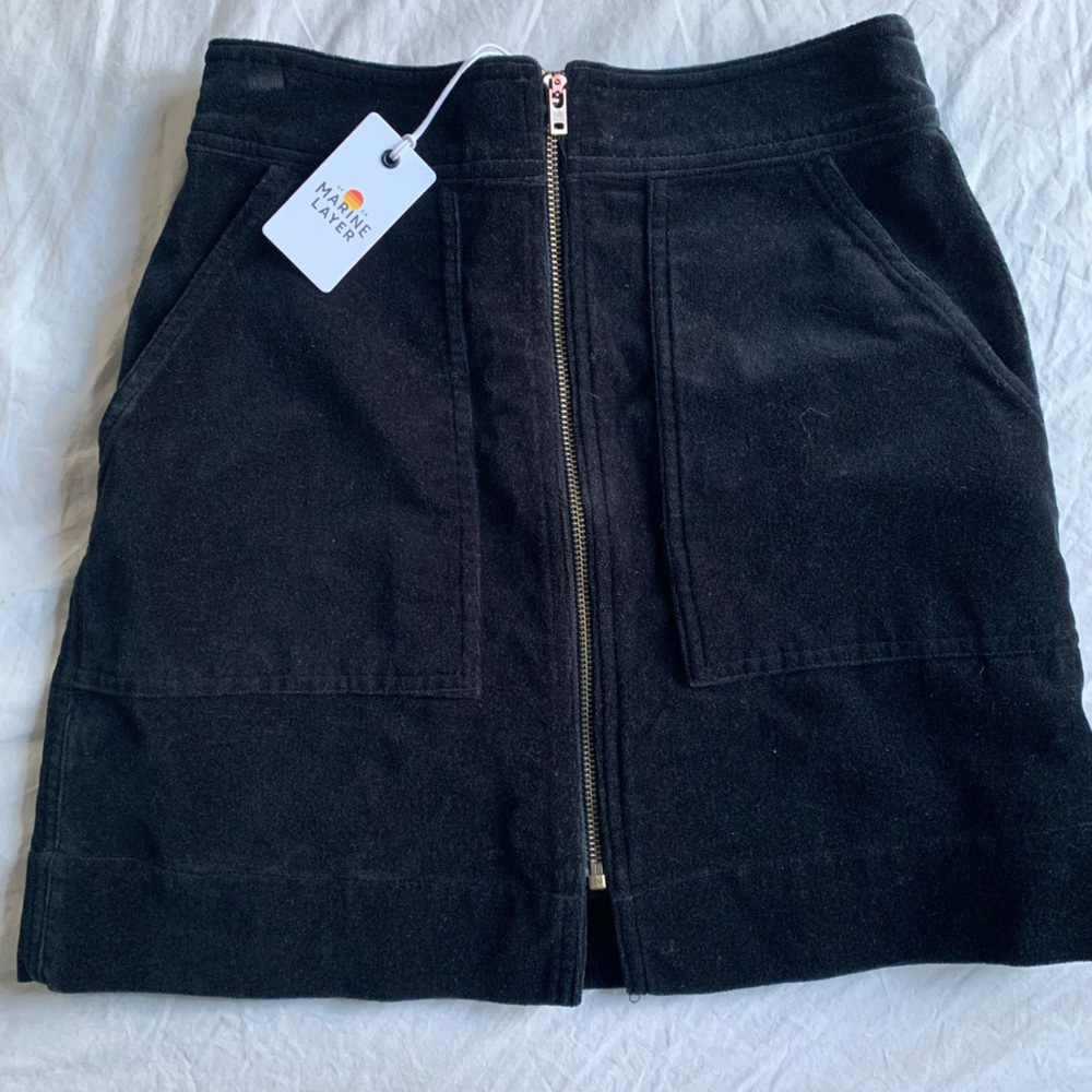 Marine layer skirt